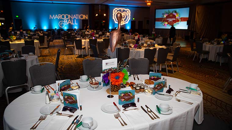 Dinner table set at MarooNation Ball event.
