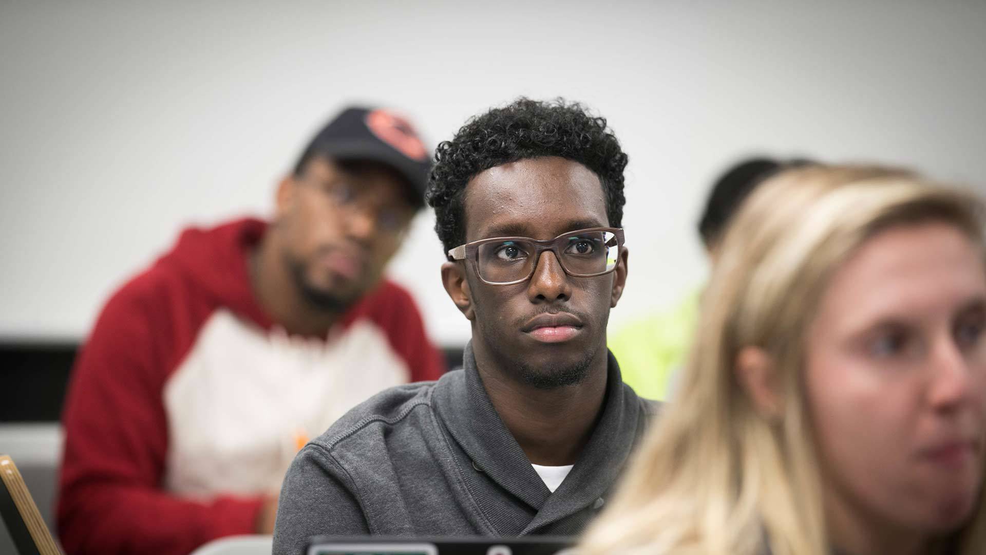 Student paying attention in class.