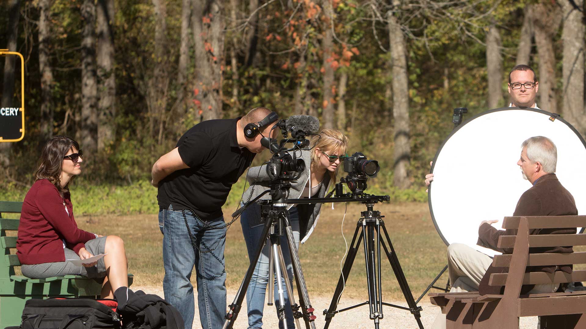 Film crew recording interview