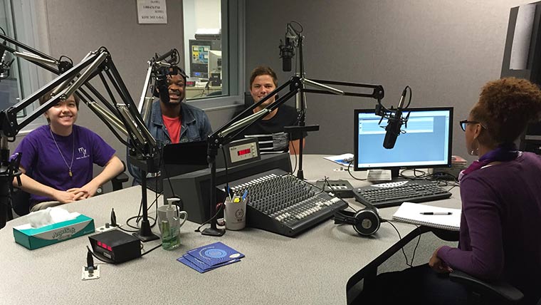 Students in radio booth.