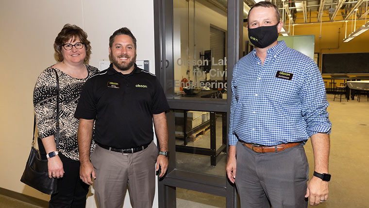 Staff from Olsson posing outside of the Olsson Lab for Civil Engineering in the Plaster Enterprise Center. Olsson is a national engineering company with offices in Springfield.