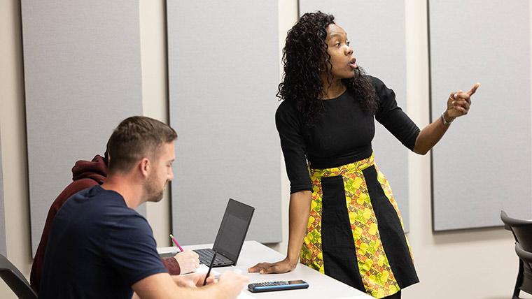 Engineering professor Dr. Tayo Obafemi-Ajayi talking to her class during a lecture.