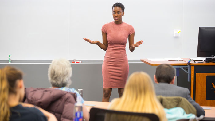 Maya Sudduth presenting her senior project