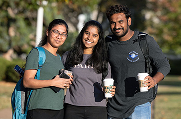 Three MSU students enjoying coffee.