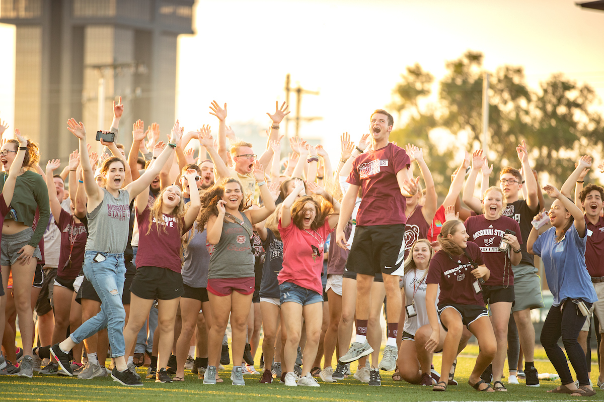 A group of students at Playfair celebrating on campus.