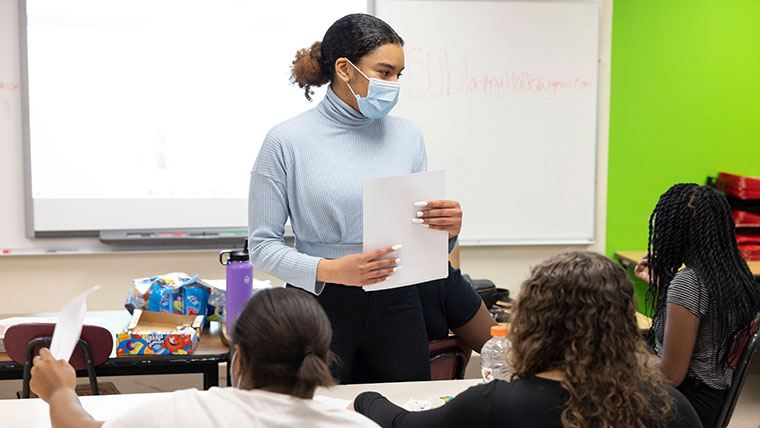 Psychology students working in experimental lab.