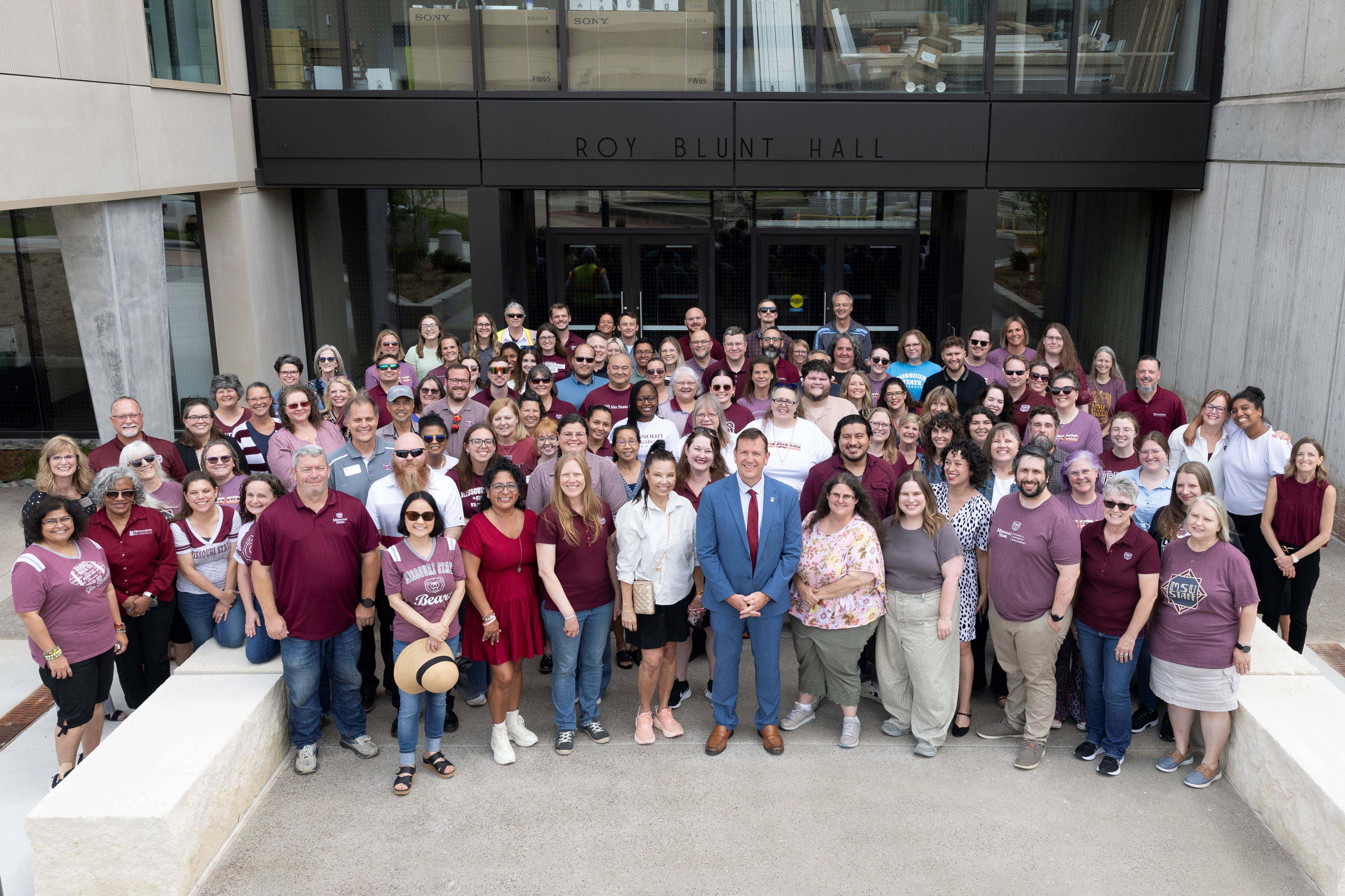 Staff pose in front of Blunt Hall for the 2025 picture