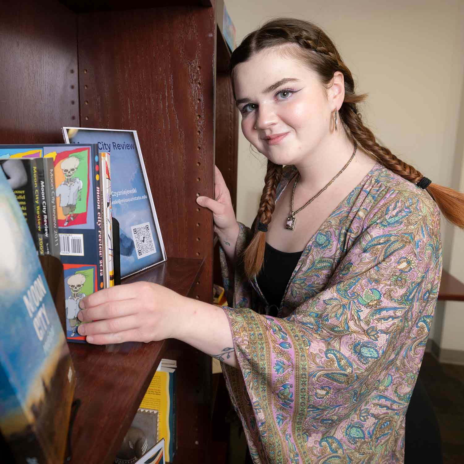 Alana Rowan Alana Rowan, a graduate student in the English department, poses next to a bookcase inSiceluff Hall