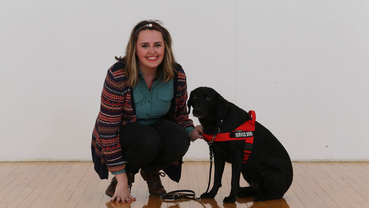 Student with service dog.