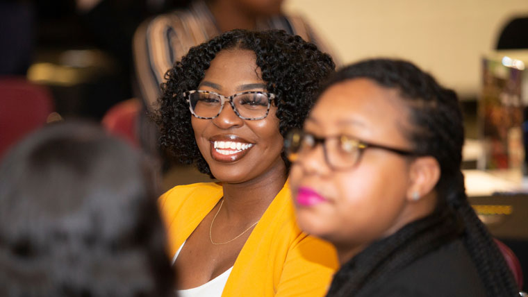 Students using attending a multicultural event.