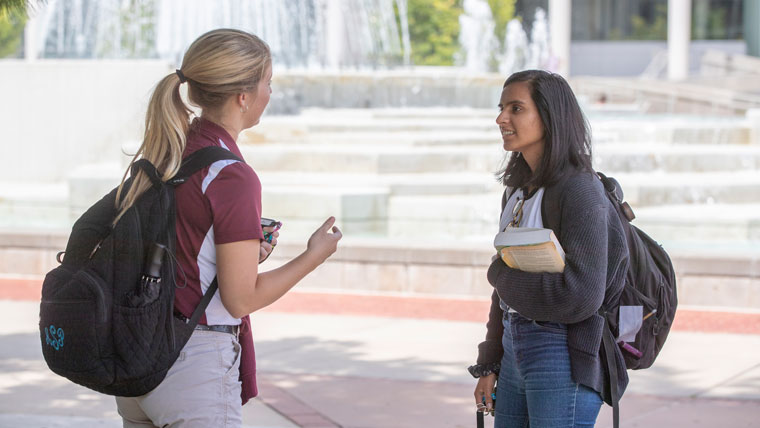 Two students talking about financial aide 