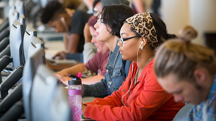 Missouri State University students use computer resources in the library. 